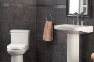 Gerber Sink & Toilet, Tiled Wall & Floor